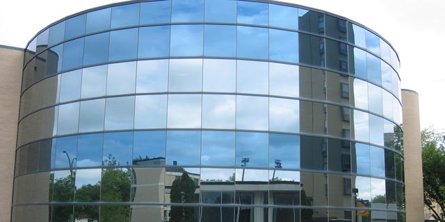 Mirrored outer wall of the John E. Robbins Library